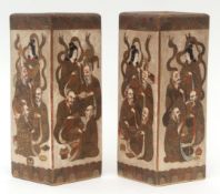 Pair of Japanese square section Satsuma earthenware vases, well decorated to each panel with