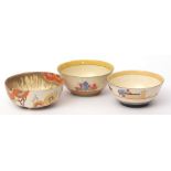 Three Clarice Cliff bowls, decorated in the Crocus pattern and Rhodanthe pattern, 20cms diam