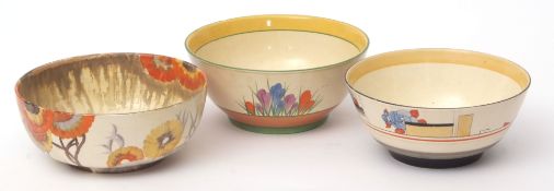 Three Clarice Cliff bowls, decorated in the Crocus pattern and Rhodanthe pattern, 20cms diam