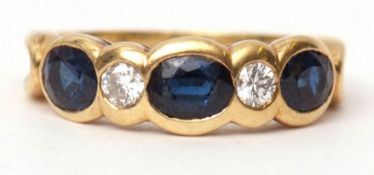 18ct gold sapphire and diamond ring, featuring three oval shaped faceted sapphires and two brilliant