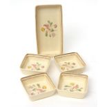 Set of six pin trays and a larger tray with floral decoration, largest 20cms long