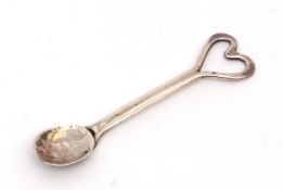 George V Arts & Crafts condiment spoon with hammered oval bowl and split stem with heart shaped