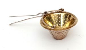 George IV parcel gilt tea strainer, pail form with gilt lined interior, cast and applied rim and