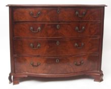 George III period mahogany secretaire chest of serpentine form, flame mahogany top with moulded edge
