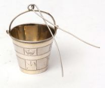 Early 20th century Russian parcel gilt tea strainer modelled in the form of a pail with wirework