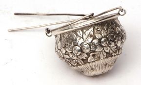 Early 20th century American silver tea strainer of basket form with pierced foliate detail and