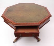 Regency period mahogany drum table of octagonal form, gilt tooled green leather inset, the frieze