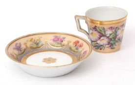 19th century Berlin cup and saucer, finely painted with a floral design within gilt borders, sceptre