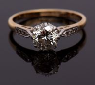 Precious metal single stone diamond ring, the brilliant cut diamond 0.60ct approx, raised between