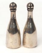 Two Victorian novelty pepper casters, each modelled in the form of a bottle of Champagne, each