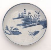 Liverpool (Reid) saucer decorated in blue and white with a man in a Sampan and Chinese islands,
