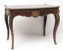 Early 19th century red boulle side table, the border applied with ornate gilt mounts over a full