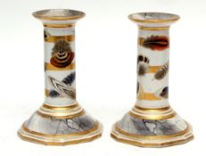 Pair of Barr, Flight & Barr Worcester candlesticks, the bases with a faux marble effect, the