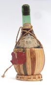 Chianti Melini 1956, 96,7cl in wicker mounted bottle