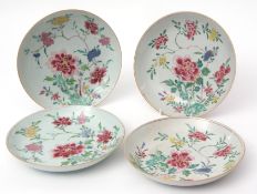 Set of four Chinese famille rose shallow dishes decorated with floral sprays, 22 1/2cms