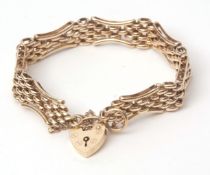 Victorian 9ct gold bracelet, a shaped bar and meshwork design, heart padlock and safety chain