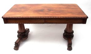 William IV period rosewood centre table, lobed moulded frieze fitted on one side with drawers,