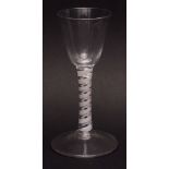 18th century round funnel double opaque cotton twist stemmed wine glass on a spreading circular