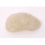 Chinese jade pendant in very pale celadon, carved as a stylised phoenix on a leafy gourd, 4.8cms