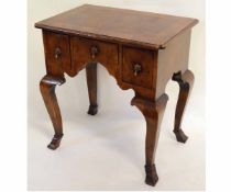 Queen Anne style walnut lowboy fitted with three drawers with brass droplet handles on shaped legs