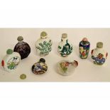 Group of five 20th century painted porcelain Chinese snuff bottles with stoppers, together with