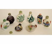 Group of five 20th century painted porcelain Chinese snuff bottles with stoppers, together with