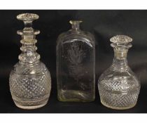 Group of two cut glass Regency period decanters and stoppers, together with a Georgian engraved