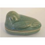 Unusual Chinese celadon miniature box formed as a bird on nest, 7cms wide