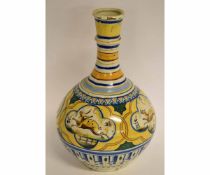 Late 19th/early 20th century faience baluster vase with knopped bottle formed neck, decorated with