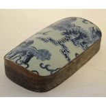 Unusual Oriental silvered metal and ceramic lidded rectangular box, the domed ceramic lid