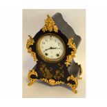 French style black lacquered mantel clock with decorative gilt mounts of a blue tit among rosehips