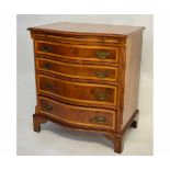 Reproduction serpentine fronted chest with brushing slide over four graduated drawers on bracket