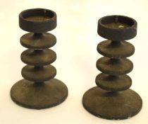 Pair of ribbed metal candlesticks, the base designed and made by Robert Welch, Chippenham, 14cms