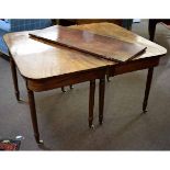 19th century mahogany D-end dining table, each end supported by four turned legs raised on porcelain