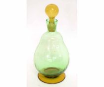 Art Deco period blown green glass decanter with amber glass foot and stopper, 24cms tall