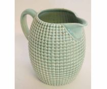 Clarice Cliff water jug, the green ground with a pineapple type design, 16cms high, the base stamped
