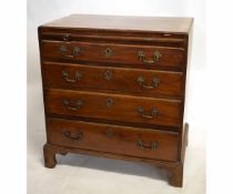 18th century oak lined bachelor's chest with brushing slide over four graduated drawers on bracket