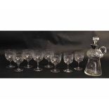 Set of six cut glass wine glasses, two smaller examples, together with a thistle shaped cut glass