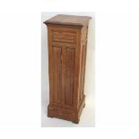 19th century pitch pine square formed column with linenfold carved panels, 40cms square x 118cms