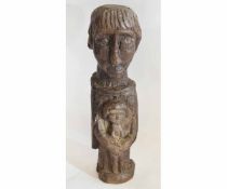 Oak carved figure of possibly St Joseph with child to front, signed to base, 36cms tall