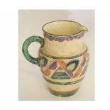 Pottery jug with geometric Art Deco incised design and rope handle, the jug impressed Collard