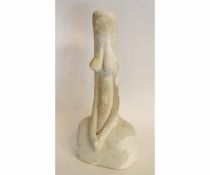 A stylised plaster sculpture of a female nude, 49cms high