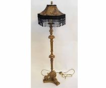 Good quality gilt resin formed standard lamp with a lattice formed column supported on three