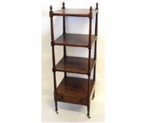 19th century rosewood four-tier whatnot with acorn finials and turned support fitted with single