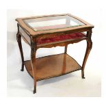 19th century kingwood and brass mounted bijouterie table with red lined interior with open shelf