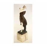 Art Deco style classical maiden in bronze and ivory effect on an onyx base, 35cms high