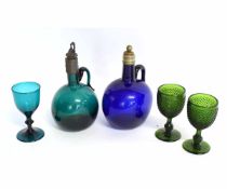 Group comprising two Victorian moulded green glass wines, and a clear green glass example plus a