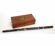 Vintage ebonised flute in case, 68cms long