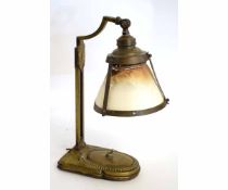 Late 19th century brass table lamp with a swivel design and shade, 33cms high