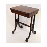 Georgian mahogany small proportion fold-over card table supported by open ends and a turned